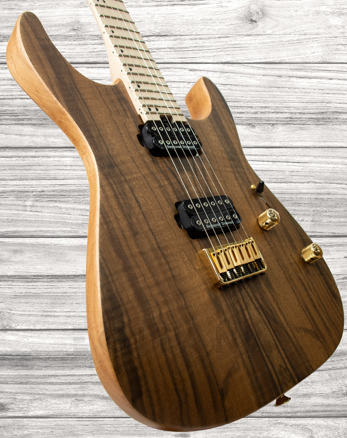 charvel-pro-mod-dk24-hh-ht-m-figured-walnut-natural_5f19ac7d8fdfb.jpg