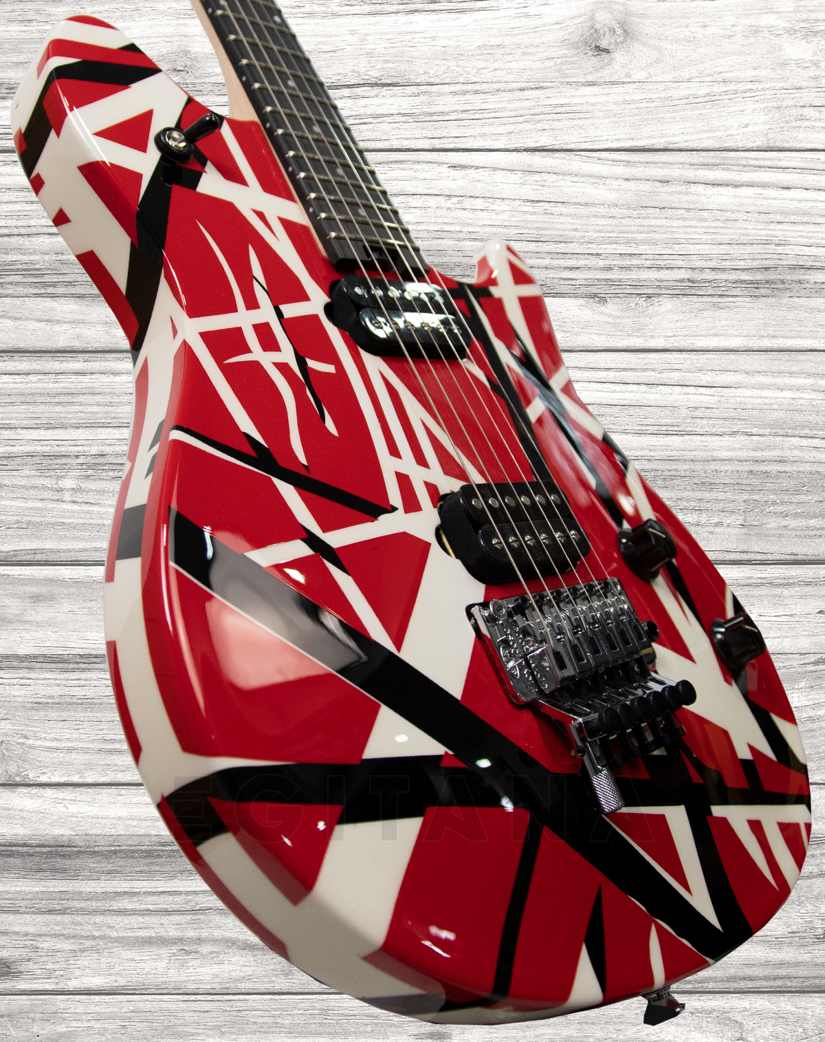 evh-wolfgang-special-striped-ebony-red-black-white-stripes_5f5b5325dd714.jpg