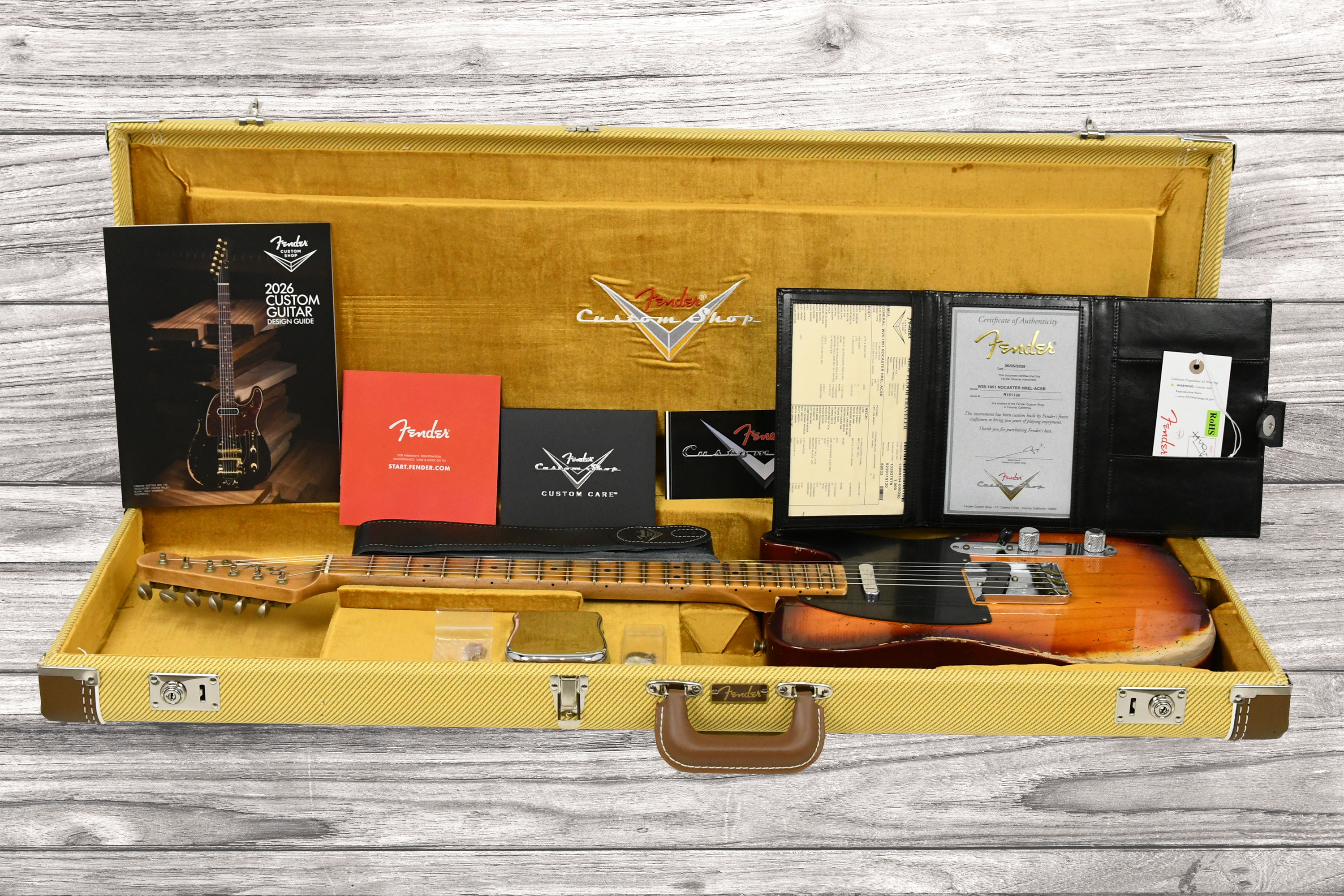 fender-custom-shop-1951-nocaster-heavy-relic-mn-aged-cherry-sunburst_6aaac34ce1f12.jpg