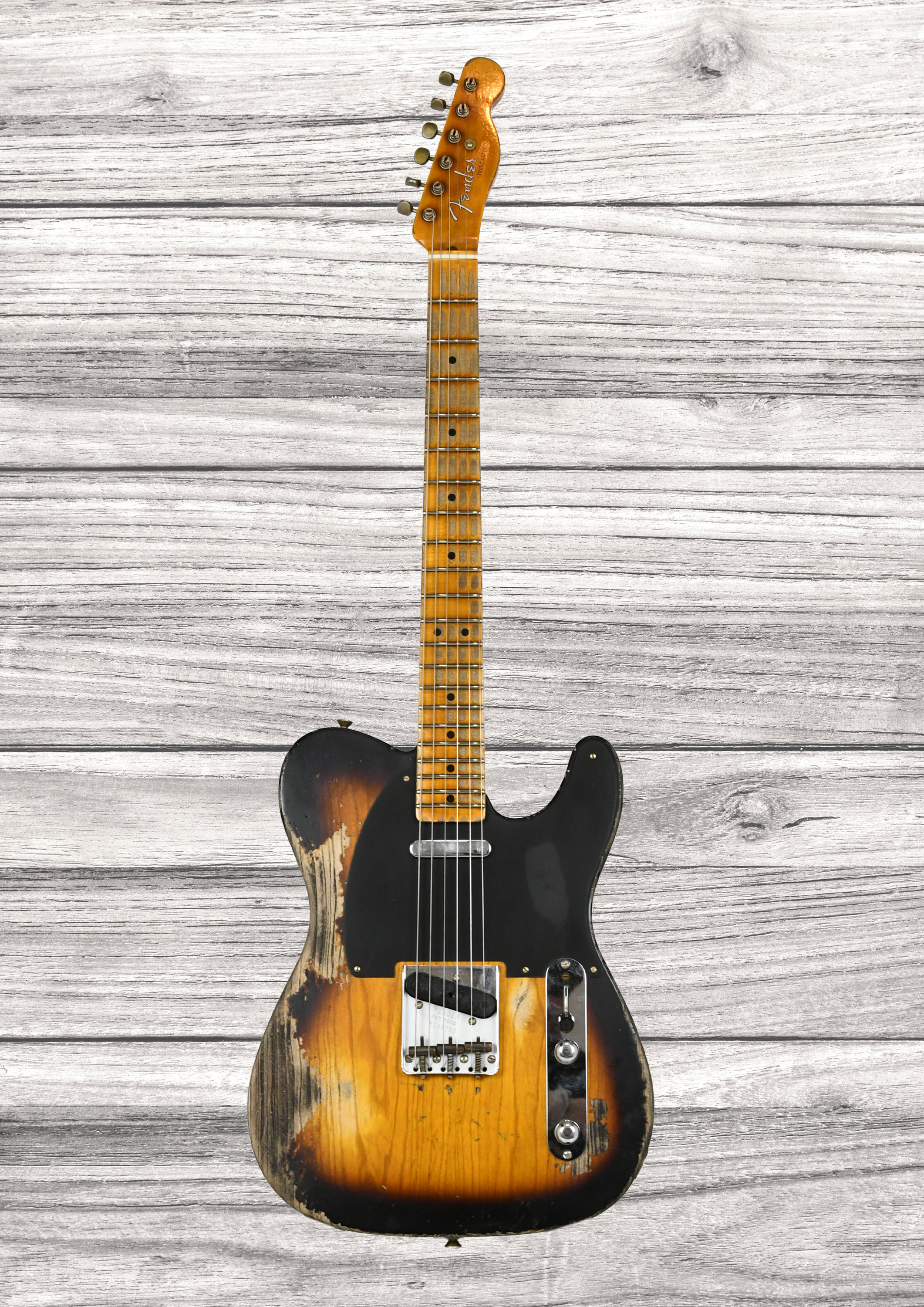 fender-custom-shop-1952-telecaster-super-heavy-relic-faded-violin-burst_6a3d572ff0235.jpg