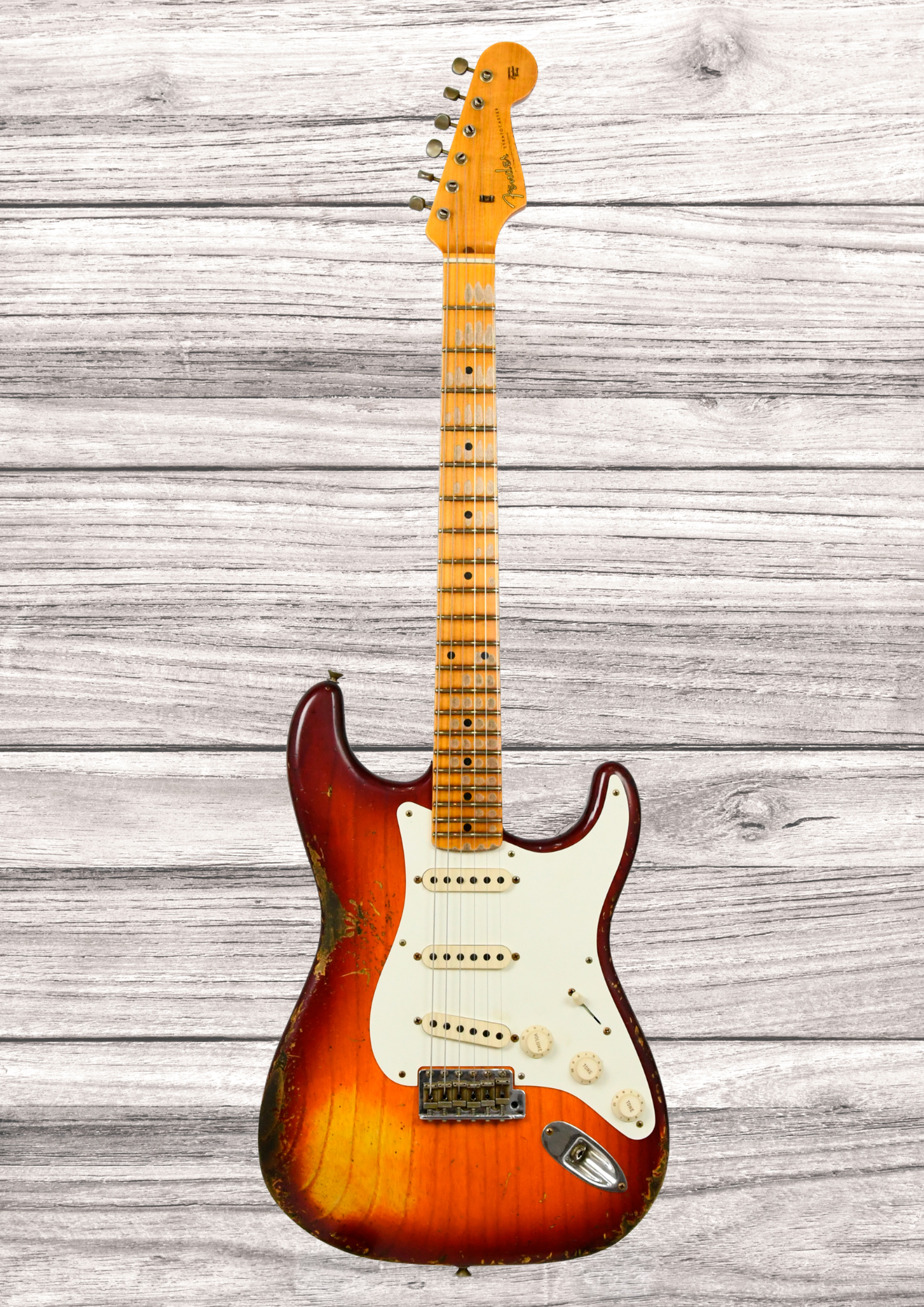 fender-custom-shop-1957-stratocaster-heavy-relic-mn-aged-cherry-sunburst_6aaaa582a6982.jpg