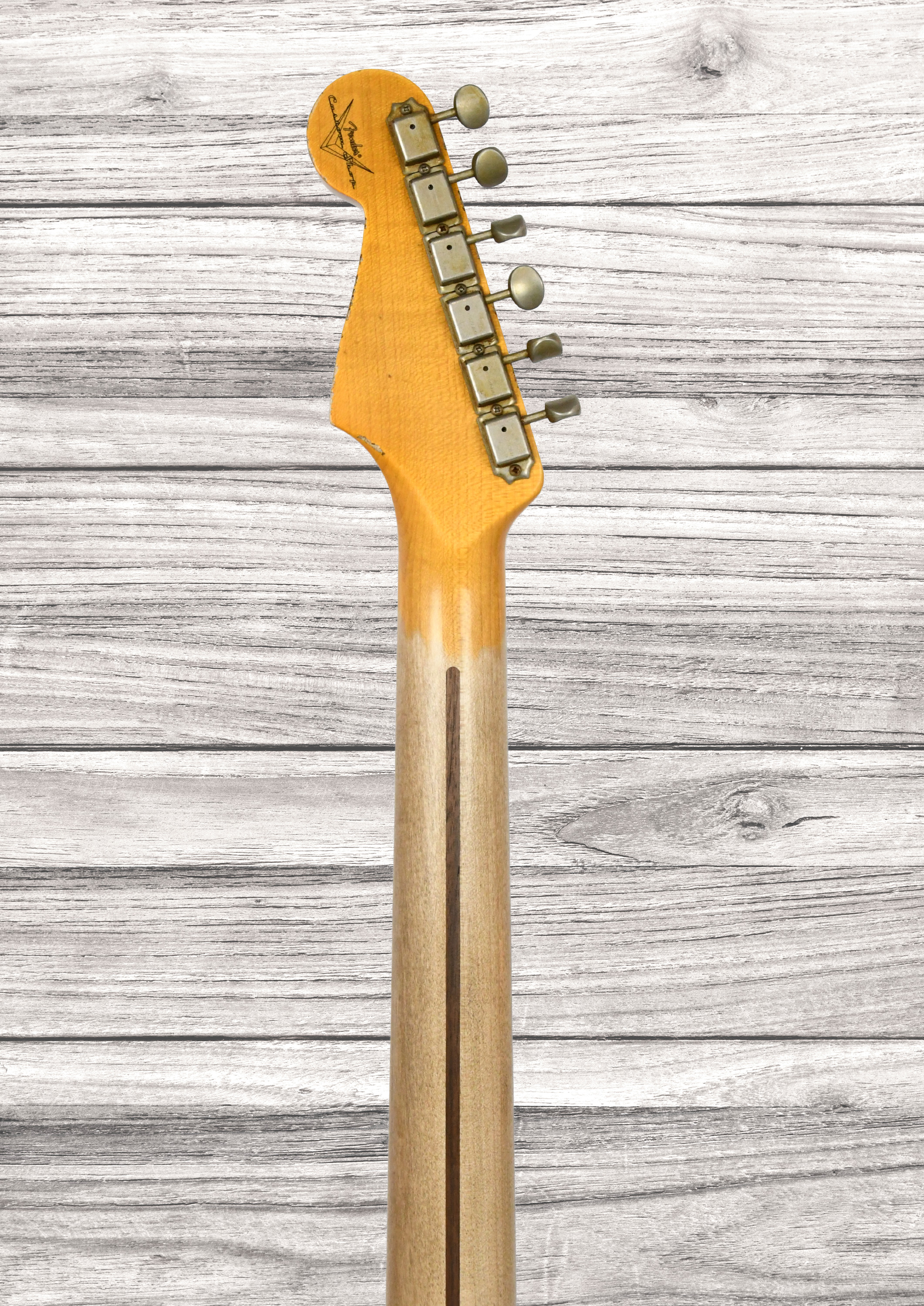 fender-custom-shop-1957-stratocaster-heavy-relic-mn-aged-cherry-sunburst_6aaaa587e8a2b.jpg