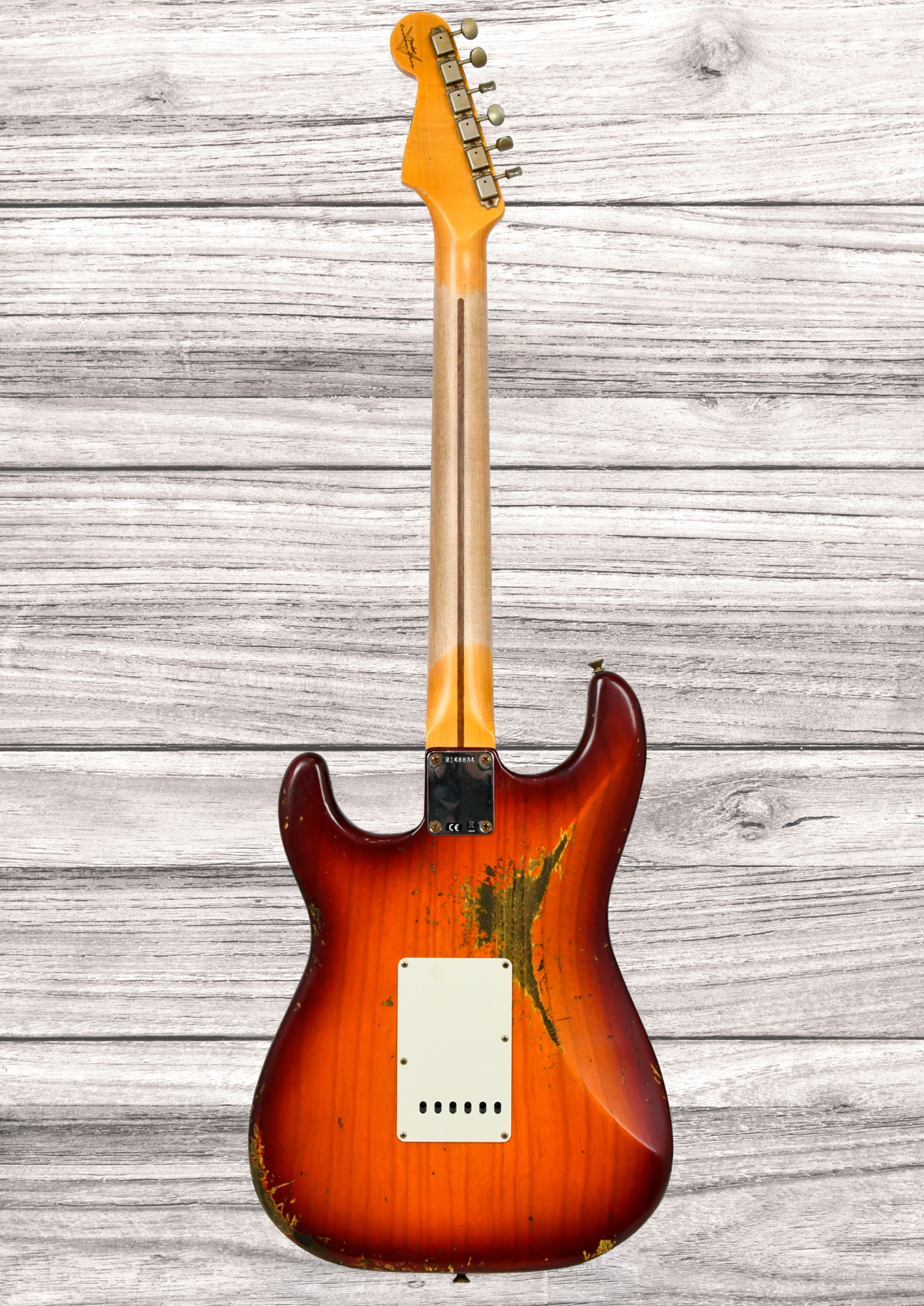 fender-custom-shop-1957-stratocaster-heavy-relic-mn-aged-cherry-sunburst_6aaaa58a8a949.jpg