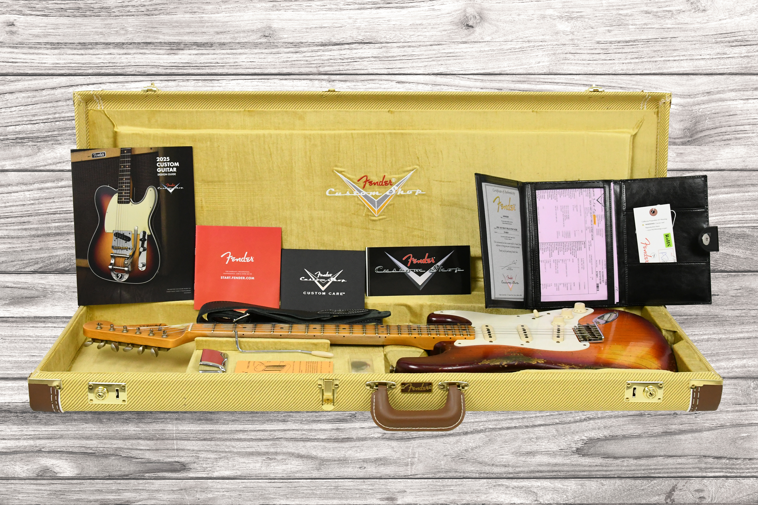 fender-custom-shop-1957-stratocaster-heavy-relic-mn-aged-cherry-sunburst_6aaaa592519f7.jpg