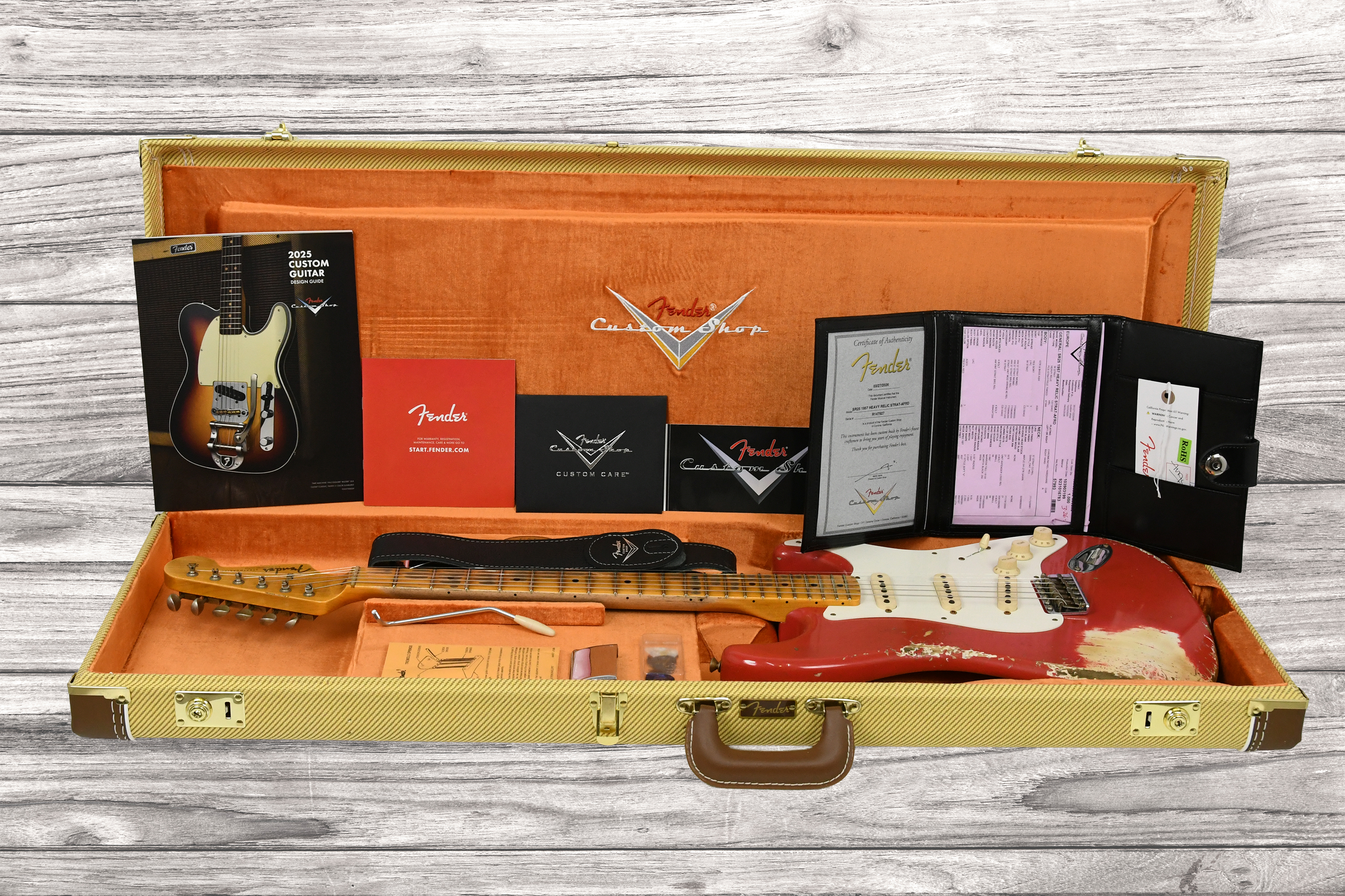 fender-custom-shop-1957-stratocaster-heavy-relic-mn-aged-fiesta-red_6aaab89a6aa07.jpg