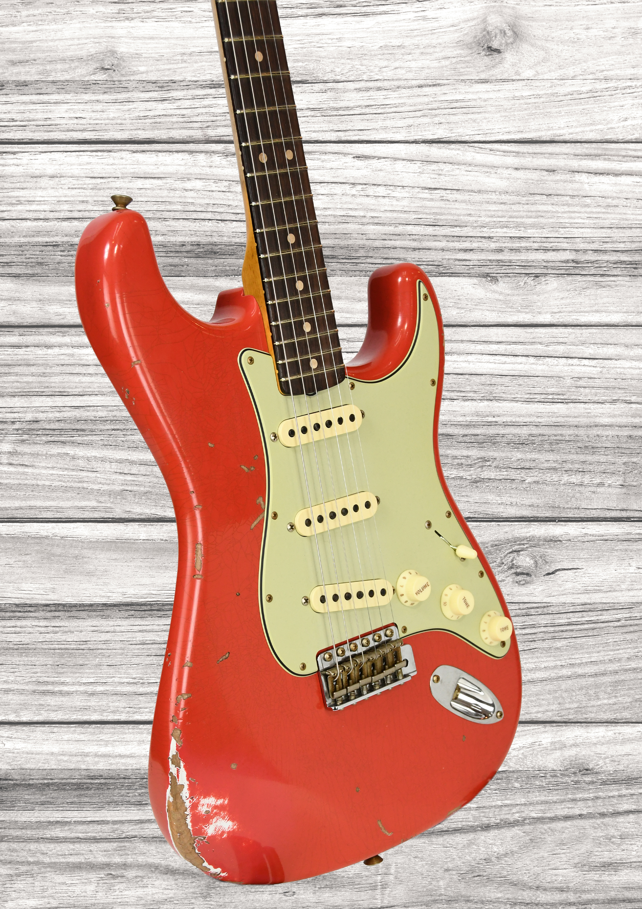 fender-custom-shop-63-stratocaster-heavy-relic-aged-fiesta-red_68fa414b00fd4.jpg