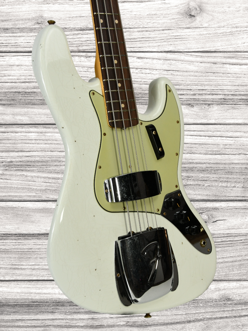 fender-custom-shop-64-jazz-bass-journeyman-relic-olympic-white-rw_65bb73a8868cd.png