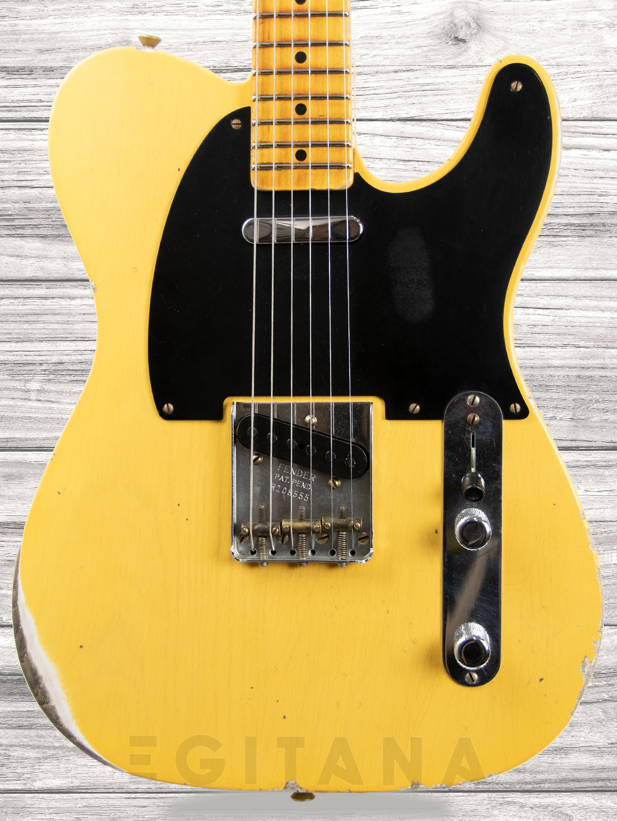 fender-custom-shop-70th-anniversary-relic-broadcaster-aged-blonde_606c8765c9cc5.jpg