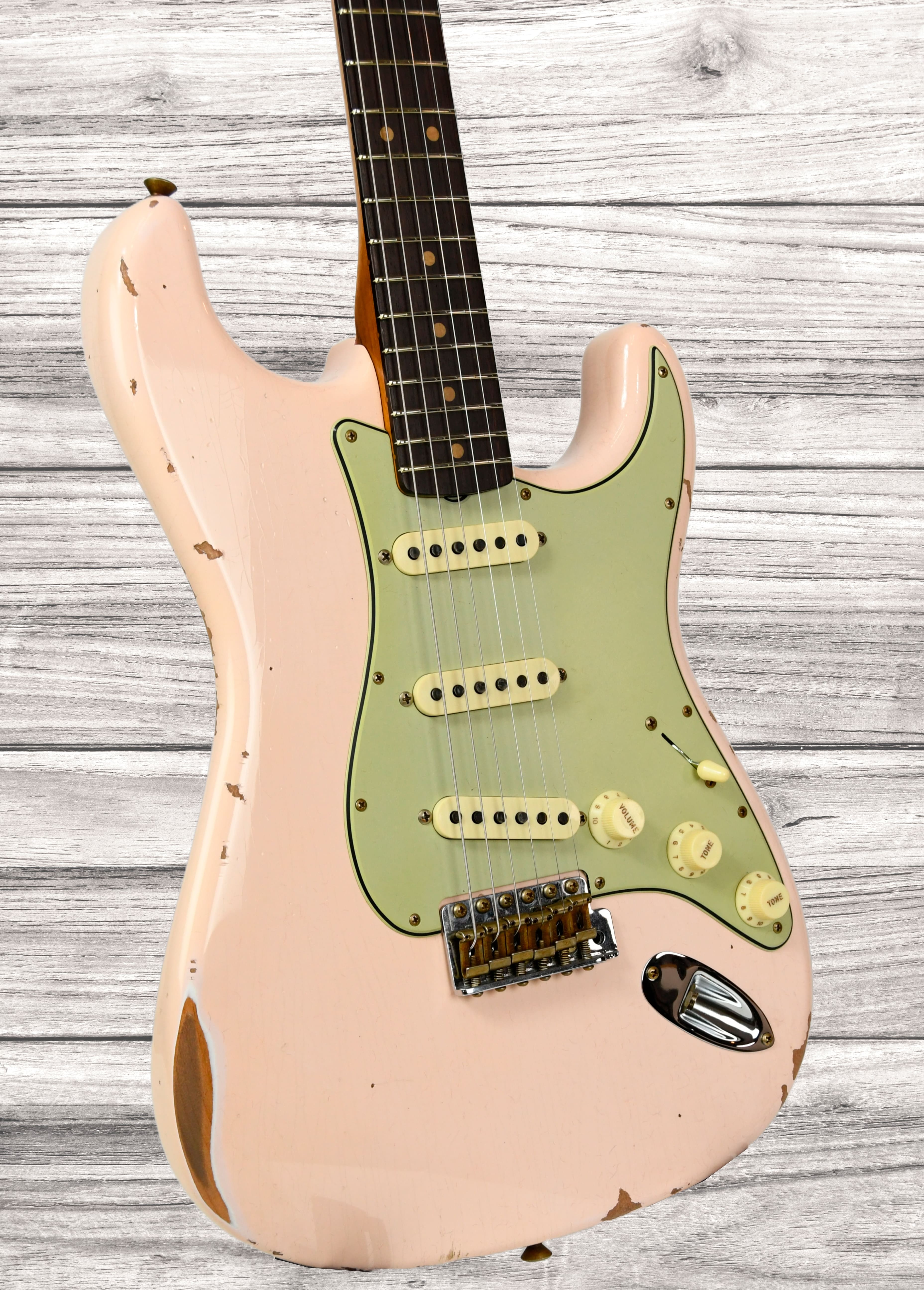 fender-custom-shop-limited-edition-63-strat-relic-super-faded-aged-shell-pink_679364d70346c.jpg