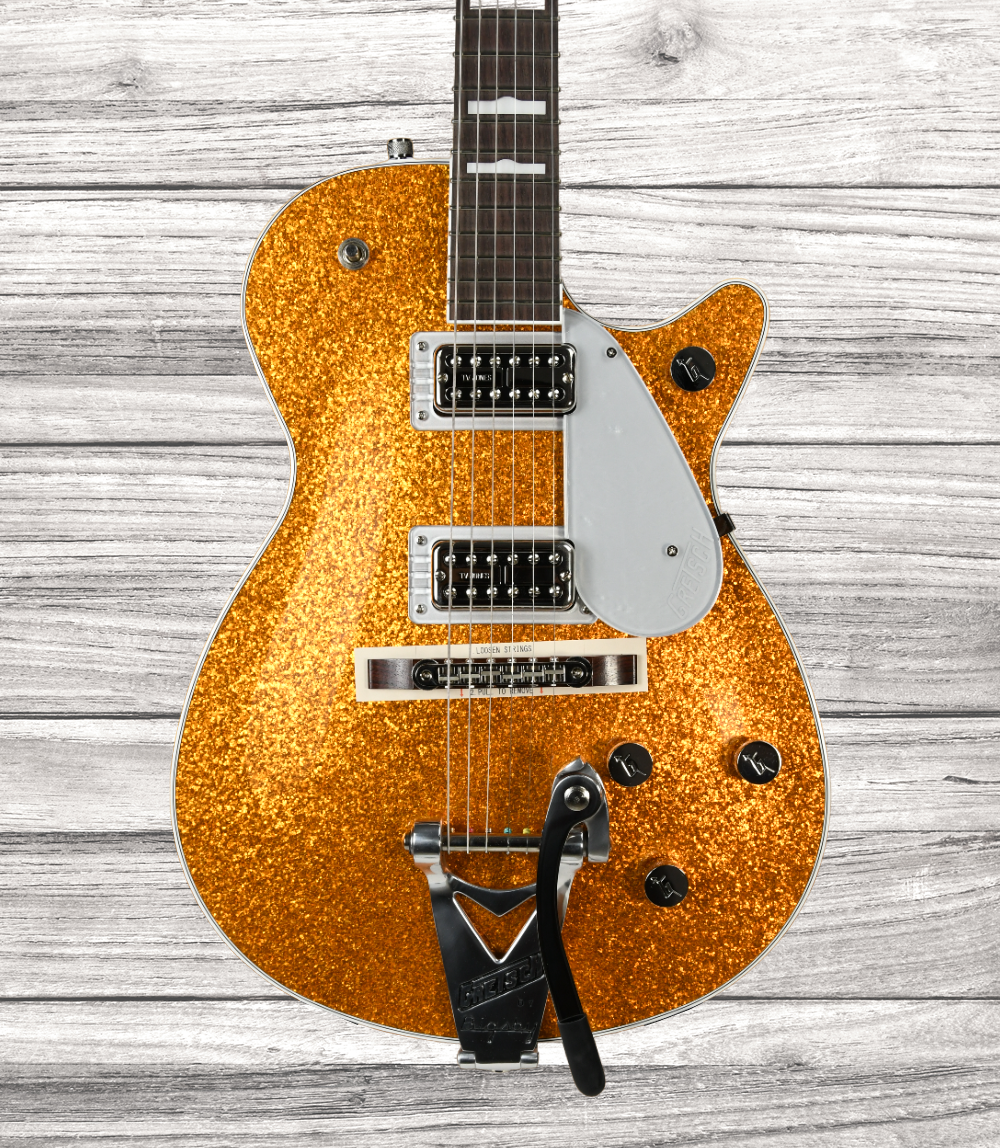 gretsch-g6129t-89-vintage-select-89-sparkle-jet-bigsby-rosewood-fingerboard-gold-sparkle_64b55b05b3f88.png