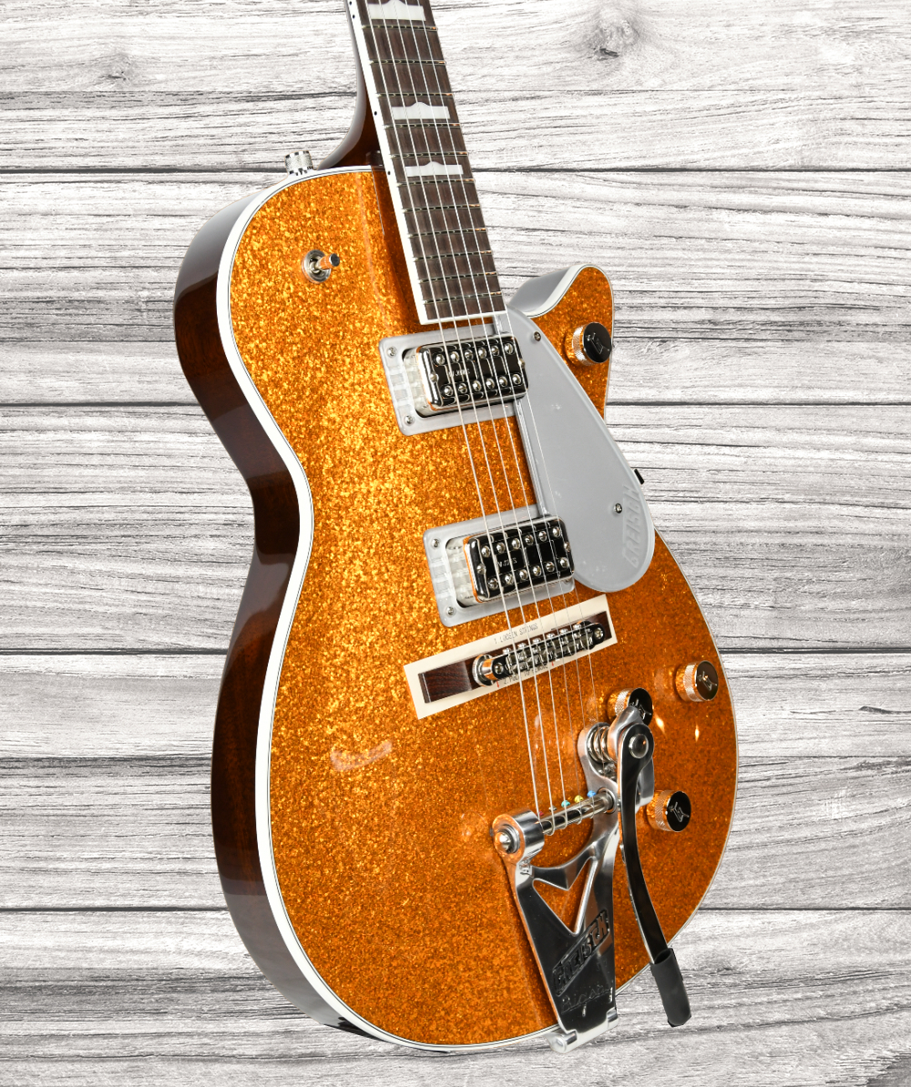 gretsch-g6129t-89-vintage-select-89-sparkle-jet-bigsby-rosewood-fingerboard-gold-sparkle_64b55b0662daa.jpg