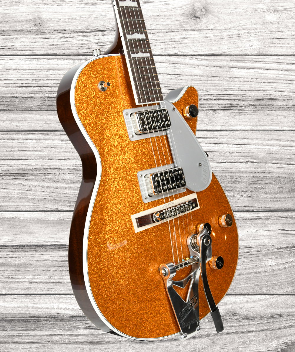 gretsch-g6129t-89-vintage-select-89-sparkle-jet-bigsby-rosewood-fingerboard-gold-sparkle_64b55b7a7a59d.png