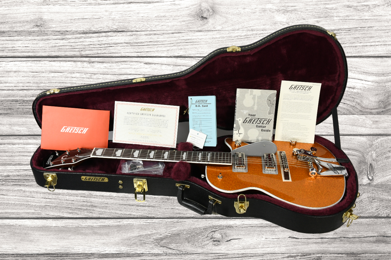 gretsch-g6129t-89-vintage-select-89-sparkle-jet-bigsby-rosewood-fingerboard-gold-sparkle_64b55b7e1fea7.jpg