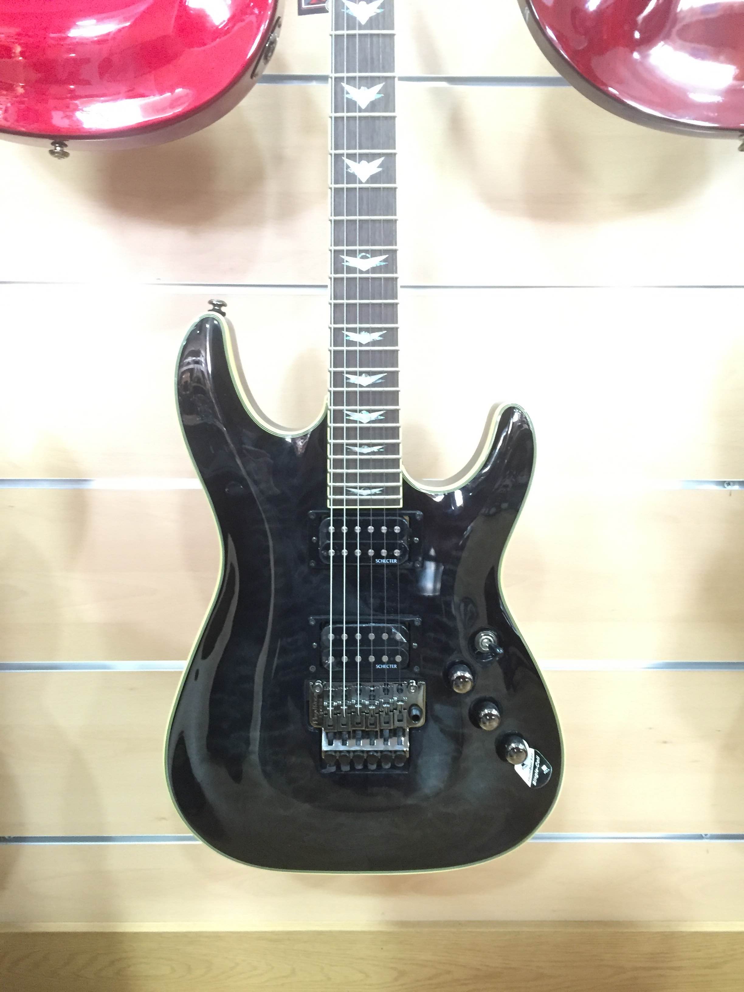 schecter-omen-extreme-green-vista-frontal_56012f1a659ad.jpg